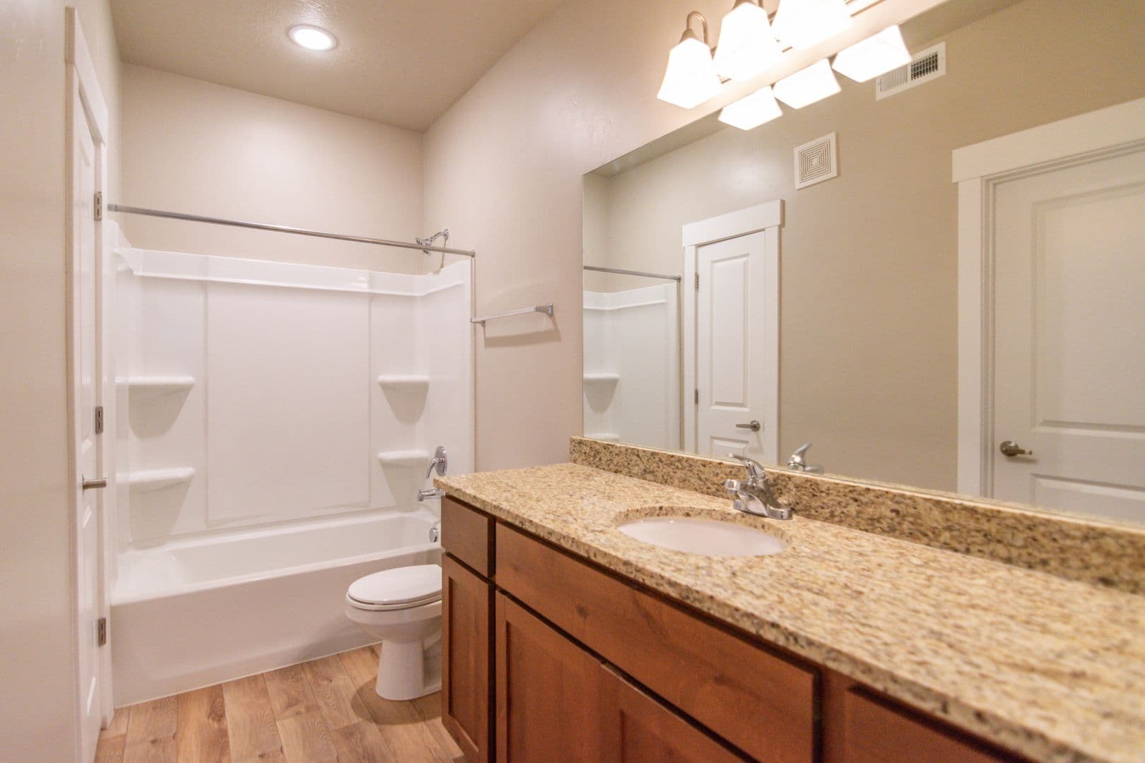 Bathroom with granite vanity